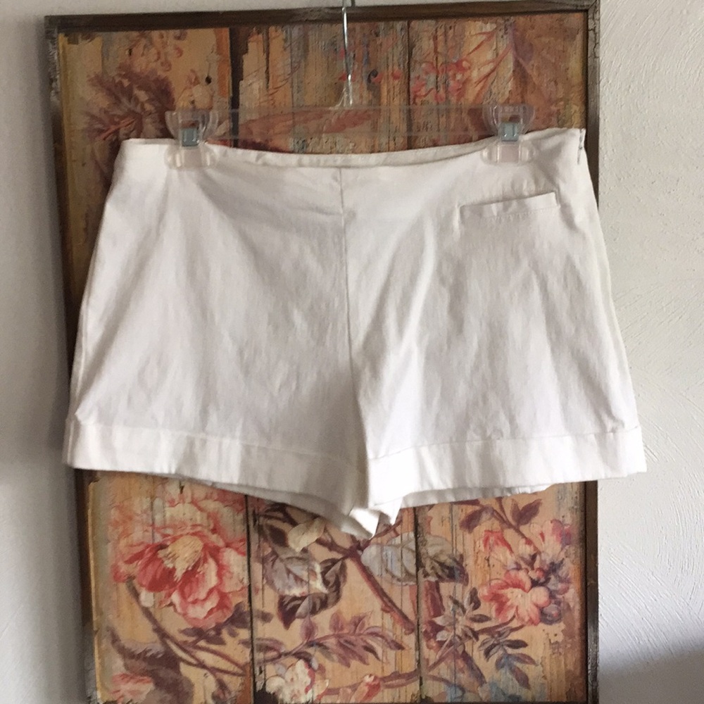 STRETCH MID RISE FLAT FRONT SIDE ZIP SHORTS 7 4 6